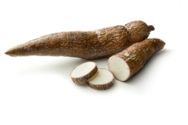Whole and sliced cassava roots. Whole and sliced cassava roots.