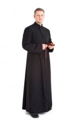 A priest wearing a cassock. A priest wearing a cassock.