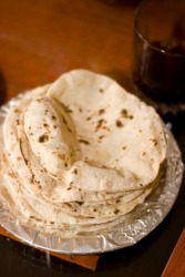 A stack of chapati bread. A stack of chapati bread.