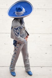 A Mexican charro in traditional clothing. A Mexican charro in traditional clothing.
