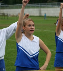 A young cheerleader at work. A young cheerleader at work.