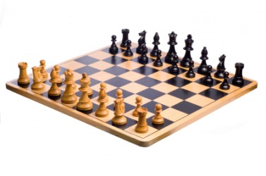 Chesspieces on a chessboard. Chesspieces on a chessboard.