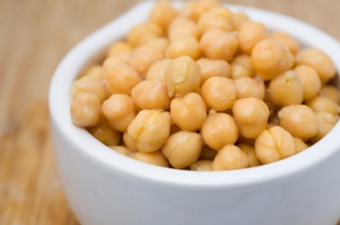 A bowl of cooked chickpeas. A bowl of cooked chickpeas.