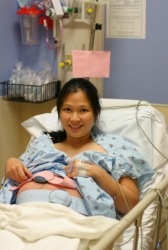 A woman preparing for childbirth. A woman preparing for childbirth.