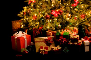 A tree with presents on Christmas Eve. A tree with presents on Christmas Eve.