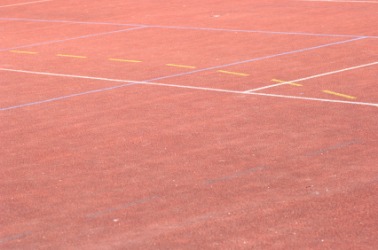 Markings on a cinder track. Markings on a cinder track.