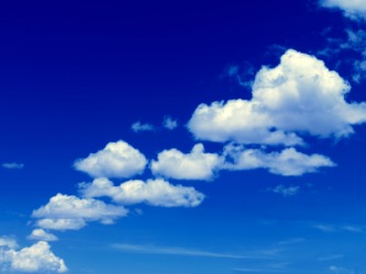 White clouds against a blue sky. White clouds against a blue sky.