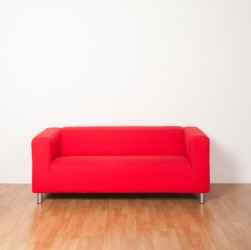 A bright red couch. A bright red couch.
