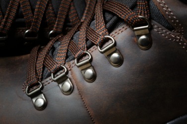 Boot laces running through d-rings. Boot laces running through d-rings.