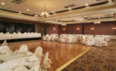 A dance hall decorated for a wedding. A dance hall decorated for a wedding.