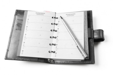 An open datebook. An open datebook.