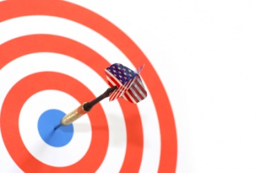 A dart stuck dead center in the target. A dart stuck dead center in the target.