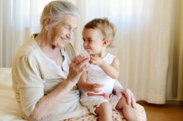 A great-grandmother with her descendant. A great-grandmother with her descendant.