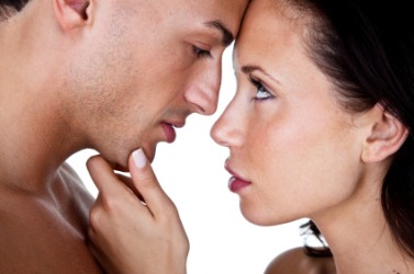 Two people looking at each other with desire. Two people looking at each other with desire.