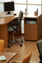 A desk in a modern office. A desk in a modern office.