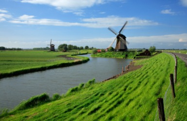 A dike alongside a canal. A dike alongside a canal.