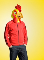 This mans disguise is a chicken mask. This mans disguise is a chicken mask.