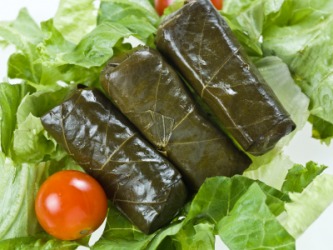 A plate of dolmas. A plate of dolmas.