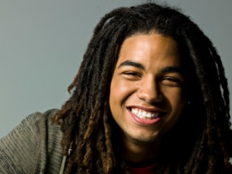 A teenager with dreadlocks. A teenager with dreadlocks.