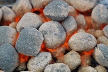 Glowing charcoal embers. Glowing charcoal embers.