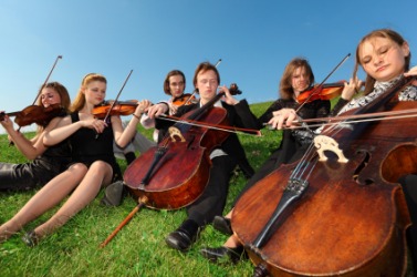 An ensemble of classical musicians. An ensemble of classical musicians.