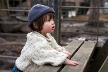 This child is enthralled by something she sees. This child is enthralled by something she sees.