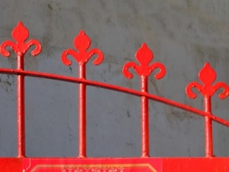 Parts of an iron gate that are equidistant. Parts of an iron gate that are equidistant.