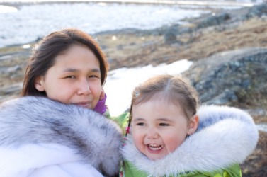 An Eskimo mother and daughter. An Eskimo mother and daughter.
