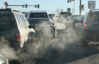 Exhaust fumes from numerous automobiles. Exhaust fumes from numerous automobiles.