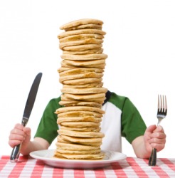 An extra large stack of pancakes. An extra large stack of pancakes.