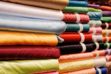 Stacks of satin fabric. Stacks of satin fabric.