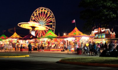 A fairground at night. A fairground at night.