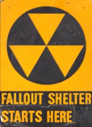 A sign for a fallout shelter. A sign for a fallout shelter.