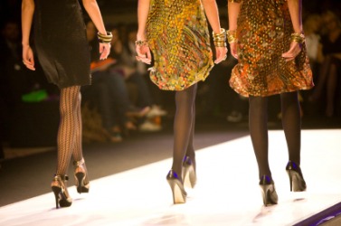 Models display the latest fashions. Models display the latest fashions.