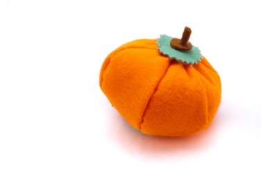 A pumpkin made from felt. A pumpkin made from felt.