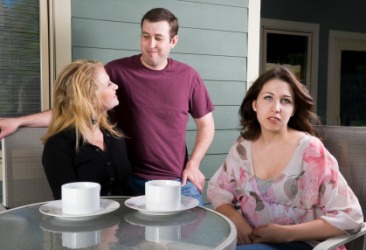 The woman on the right feels like a fifth wheel. The woman on the right feels like a fifth wheel.