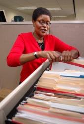 A file clerk at work. A file clerk at work.