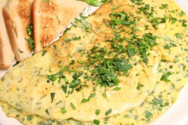 An omelet with fines herbes. An omelet with fines herbes.