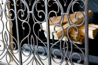 A wrought iron fire screen. A wrought iron fire screen.
