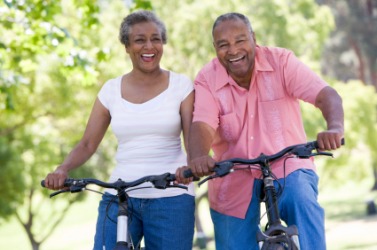 A couple improves their level of fitness with bike riding. A couple improves their level of fitness with bike riding.