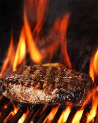 This grill is flaming. This grill is flaming.