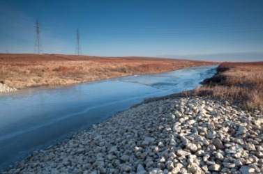A floodway on the Red River. A floodway on the Red River.