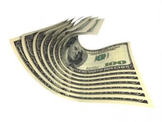 A pile of folding money. A pile of folding money.