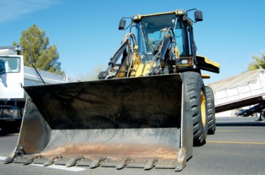 A front-end loader. A front-end loader.