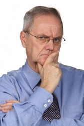 A man frowns. A man frowns.