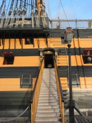 A gangway leading to an old sailing ship. A gangway leading to an old sailing ship.