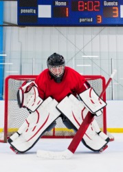 Goalkeeper at a hockey game. Goalkeeper at a hockey game.