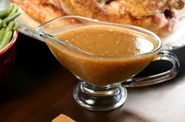 A bowl of turkey gravy. A bowl of turkey gravy.