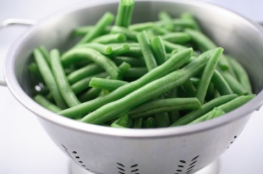 A bowl of green beans. A bowl of green beans.