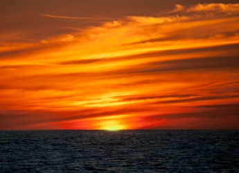 The green flash phenomenon seen at sunset. The green flash phenomenon seen at sunset.